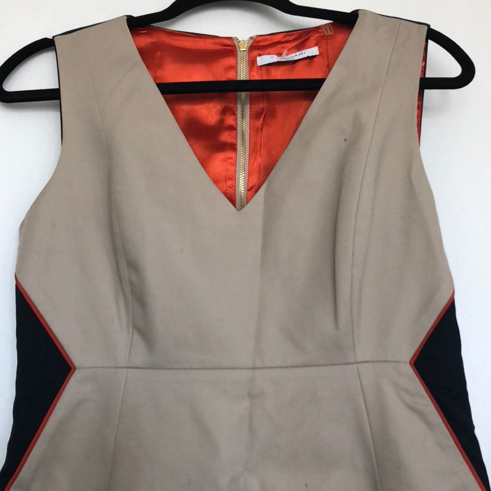 sleeveless dress with orange lining on the inside!